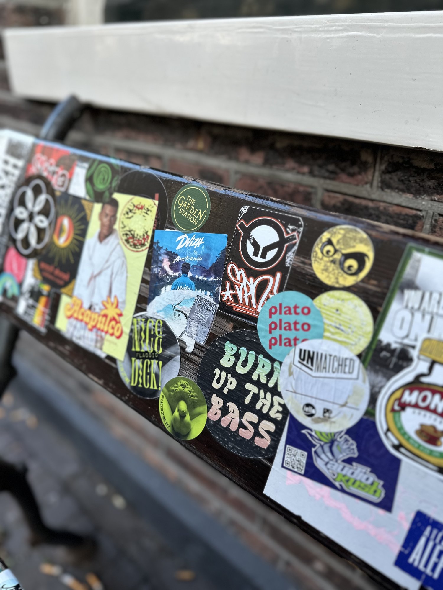 Close up of stickers on the bench backrest